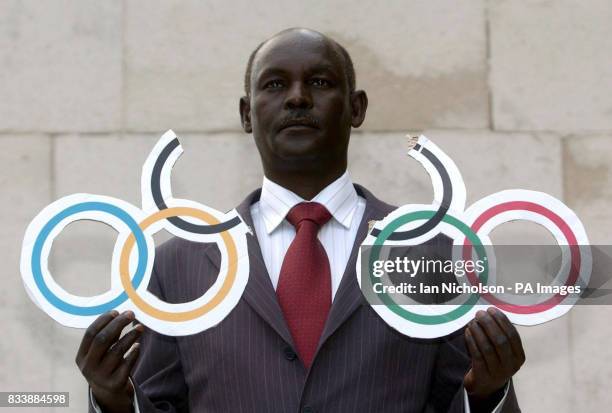 Abdul Jabbar Adam, President of the Darfur Union in the UK, joins a protest on College Green, Westminster, before handing in a letter to the Chinese...