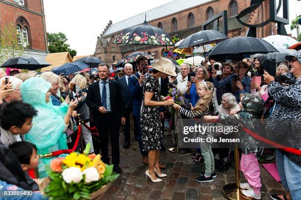Crown Princess Mary greet spectators at Odense Flower Festival which she is to open officially and where she is to be presented to a new developed...