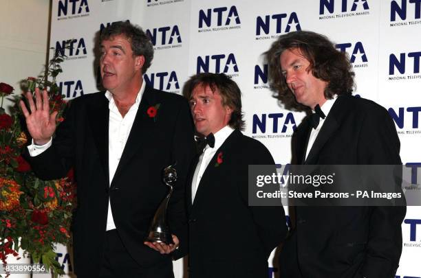 Jeremy Clarkson, Richard Hammond and James May with their award for Most Popular Factual Programme for Top Gear, back stage during the National...