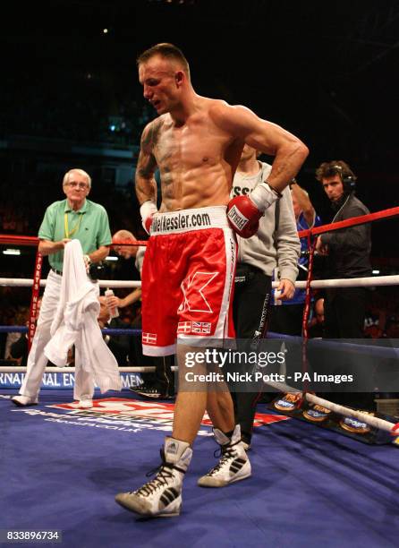 Denmark's Mikkel Kessler appears dejected as he hears the final bell in the WBO/WBA/WBC Super-Middleweight Title bout at Millennium Stadium, Cardiff.