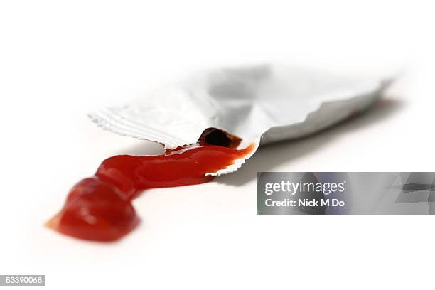 ketchup on white background - sachet stock pictures, royalty-free photos & images