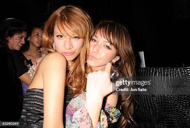 Models MARIE and Lena Fujii arrive at the Charlotte Ronson S/S 2009 Fashion Show after party on October 22, 2008 in Tokyo, Japan.