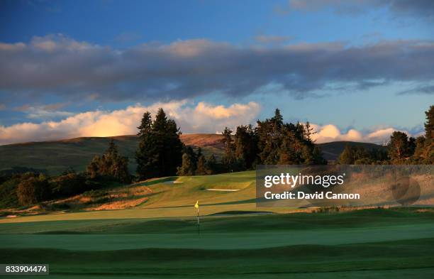 View from beside the green on the 525 yards par 5, 18th hole with the 362 yards par 4, first hole behind on the King's Course at The Gleneagles Hotel...