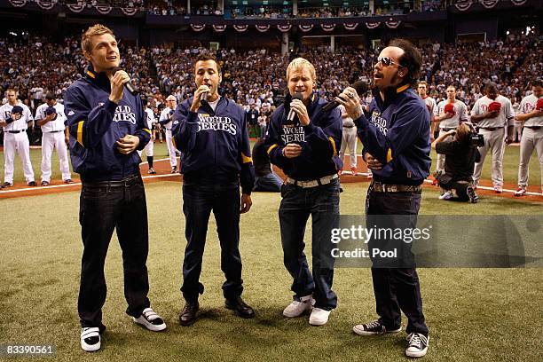 The Backstreet Boys peform the National Anthem before game one of the 2008 MLB World Series between the Philadelphia Phillies and theTampa Bay Rays...