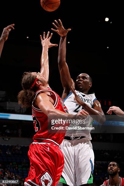 Al Jefferson of the Minnesota Timberwolves shoots against Joakim Noah of the Chicago Bulls on October 22, 2008 at the Target Center in Minneapolis,...