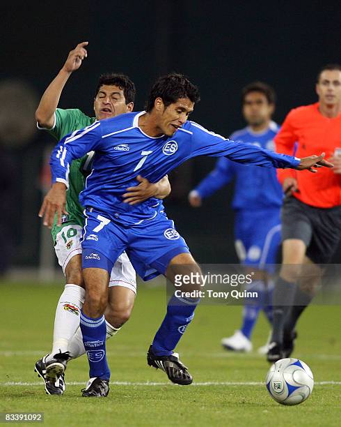 Ramon Sanchez of El Salvado blocks Darwin Pena of Bolivia during an internatiional friendly match at RFK Stadium on October 22, 2008 in Washington...