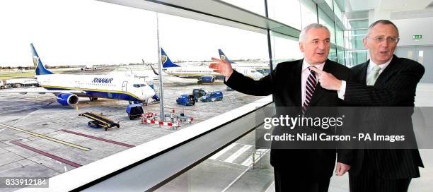 Taoiseach Bertie Ahern prepares to open the new Pier D at Dublin Airport with Dublin Airport Authority Chairman Gary McGann.