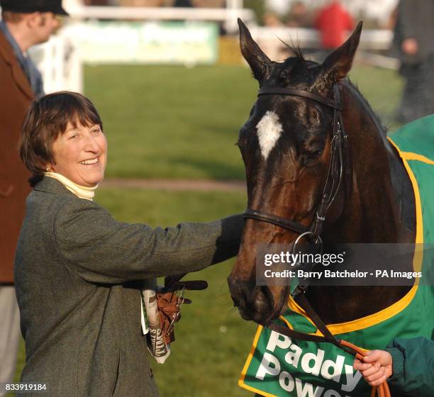 Trainer Henrietta Knight and Glasker Mill after winning the Paddypower.Com Graduation Chase at Cheltenham Racecourse.