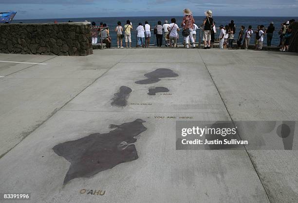 Tourists look at the Halona Blowhole from a vista point October 22, 2008 in Honolulu, Hawaii. Democratic presidential candidate Barack Obama has...