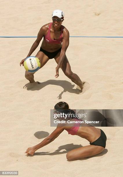 Devota Saveriana Rahawarin and Ayu Cahyaning Siam of Indonesia in action during their womens beach volleyball match against Mutsumi Ozaki and Ayumi...