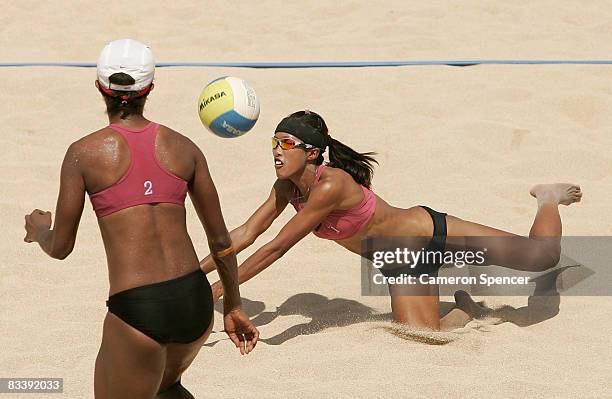 Devota Saveriana Rahawarin and Ayu Cahyaning Siam of Indonesia in action during their womens beach volleyball match against Mutsumi Ozaki and Ayumi...