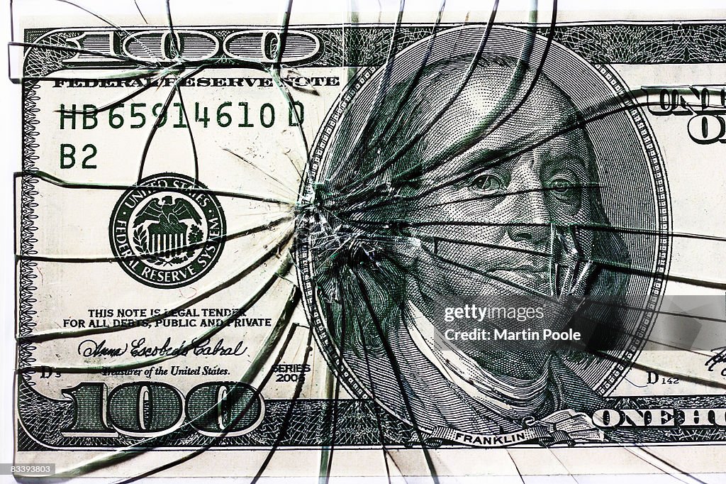 Cracked 100 dollar note