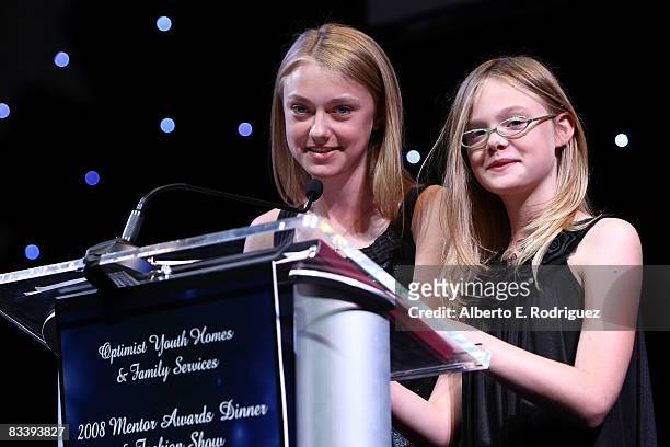 Actress Dakota Fanning and actress Elle Fanning attend The Optimist Youth Homes & Family Services' 2008 Mentor Awards Dinner and Fashion Show held at...