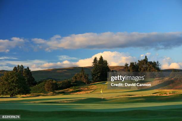 View from beside the green on the 525 yards par 5, 18th hole with the 362 yards par 4, first hole behind on the King's Course at The Gleneagles Hotel...