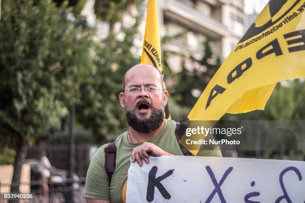 Demonstrators participate in a march and rally'From Athens to Charlottesvile' against white supremacy on August 17, 2017 in Athen, Greece. Protesters...