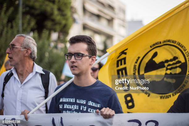 Demonstrators participate in a march and rally'From Athens to Charlottesvile' against white supremacy on August 17, 2017 in Athen, Greece. Protesters...