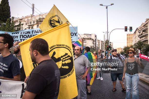 Demonstrators participate in a march and rally'From Athens to Charlottesvile' against white supremacy on August 17, 2017 in Athen, Greece. Protesters...