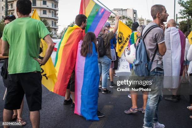 Demonstrators participate in a march and rally'From Athens to Charlottesvile' against white supremacy on August 17, 2017 in Athen, Greece. Protesters...