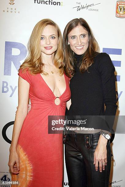 Actress Heather Graham and Photographer Nicole Maloney aarrive at the party to launch "Rare" by Nicole Maloney at the Grove on October 22, 2008 in...