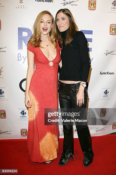 Actress Heather Graham and Photographer Nicole Maloney aarrive at the party to launch "Rare" by Nicole Maloney at the Grove on October 22, 2008 in...