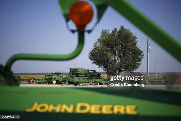Deere & Co. John Deere farm machinery sit on display at the Smith Implements Inc. Dealership in Greensburg, Indiana, U.S., on Wednesday, Aug. 16,...