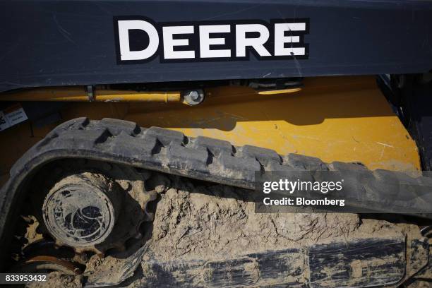 Deere & Co. John Deere construction machine sits at the Smith Implements Inc. Dealership in Greensburg, Indiana, U.S., on Wednesday, Aug. 16, 2017....