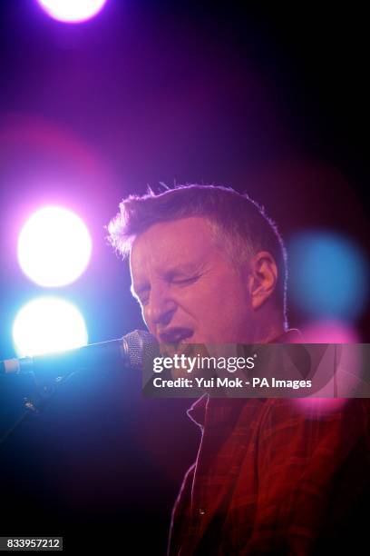 Billy Bragg performing on stage at the Union Chapel in Islington, north London, as part of the Little Noise Sessions week of gigs in aid of the...