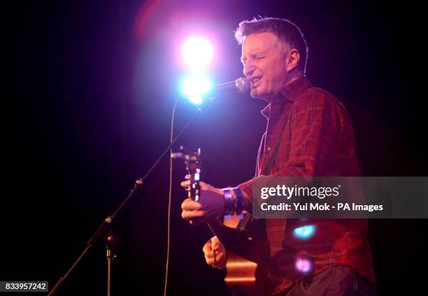 Billy Bragg performing on stage at the Union Chapel in Islington, north London, as part of the Little Noise Sessions week of gigs in aid of the...