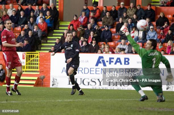 Aberdeen's James Langfield fails to stop a goal scoring shot by Hibernian's Steven Fletcher during the Clydesdale Bank Scottish Premier League match...