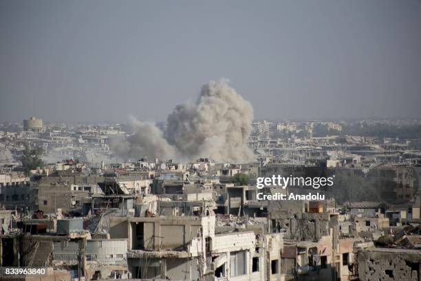 Smoke rises after Assad regime forces' carried out an air strike at the Ein Terma town of Eastern Ghouta, which is a de-conflict zone under control...