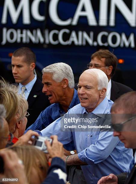 Republican presidential nominee Sen. John McCain and Florida governor Charlie Crist greet supporters during a campaign rally at All Star Building...