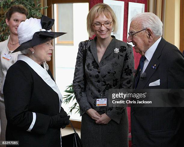 Queen Elizabeth II meets Sir Nicholas Winton at Devlin Castle Hotel on the first day of a tour of Slovakia on October 23, 2008 in Bratislava,...
