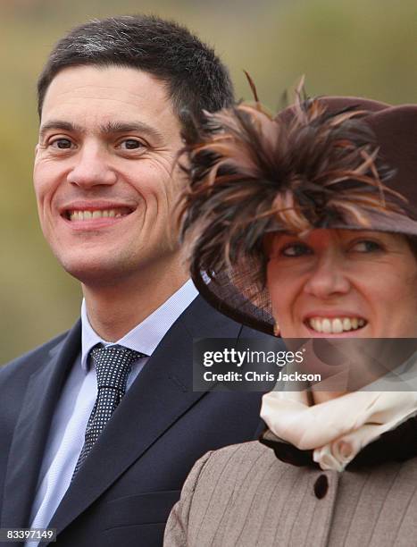 David Miliband and Louise Miliband laugh as they attend a wreath laying at Devlin Castle on the first day of a tour of Slovakia on October 23, 2008...