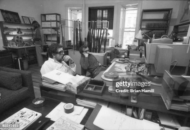 American film editor Ralph Rosenblum and film director Woody Allen watch footage from the Allen-directed movie 'Annie Hall' on an editing machine,...