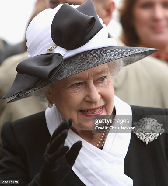 Queen Elizabeth II waves as she leaves Devlin Castle Hotel on the first day of a tour of Slovakia on October 23, 2008 in Bratislava, Slovakia. The...