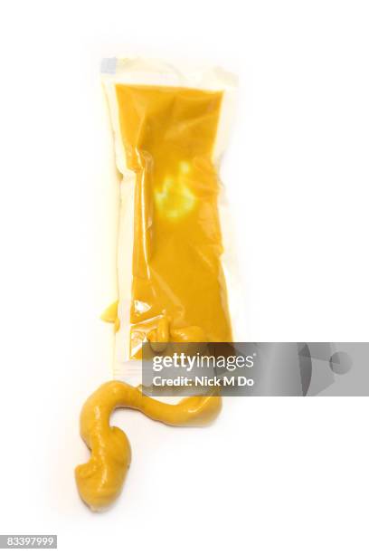 mustards on white background - bustina foto e immagini stock