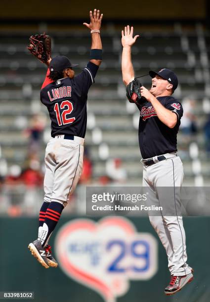 Francisco Lindor and Jay Bruce of the Cleveland Indians celebrate winning game one of a doubleheader against the Minnesota Twins on August 17, 2017...