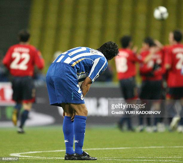Juan Carlos Valeron of Spain's Deportivo reacts as players of Russia's CSKA celebrate their goal during the UEFA Cup group H football match in Moscow...