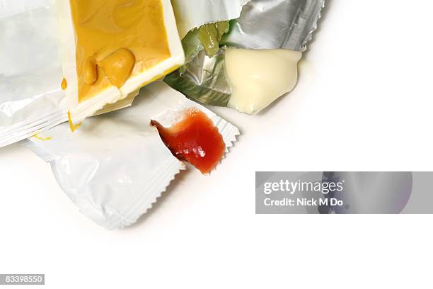 fast food sauces on white background - bustina foto e immagini stock