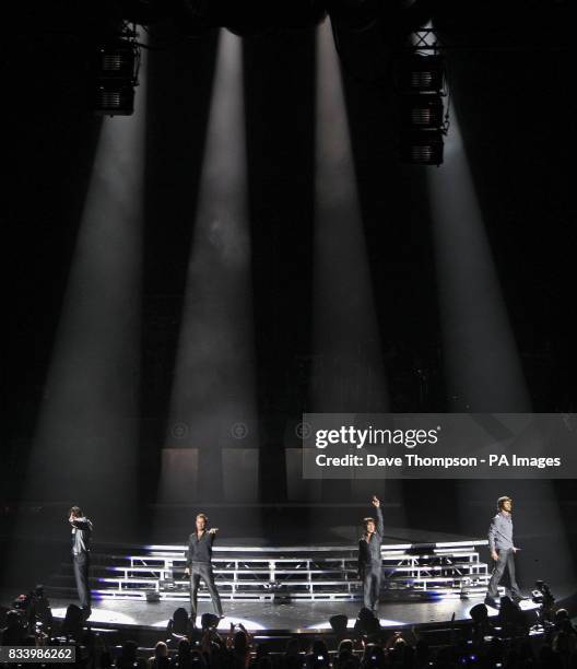 Take That perform live in concert at the MEN Arena, Manchester.