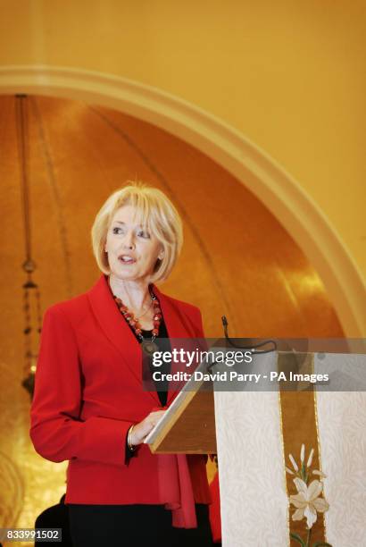 Diana Moran does a reading at St Peters Church in Belgravia, London, for the Blue Cross pet charity's Carol Concert.