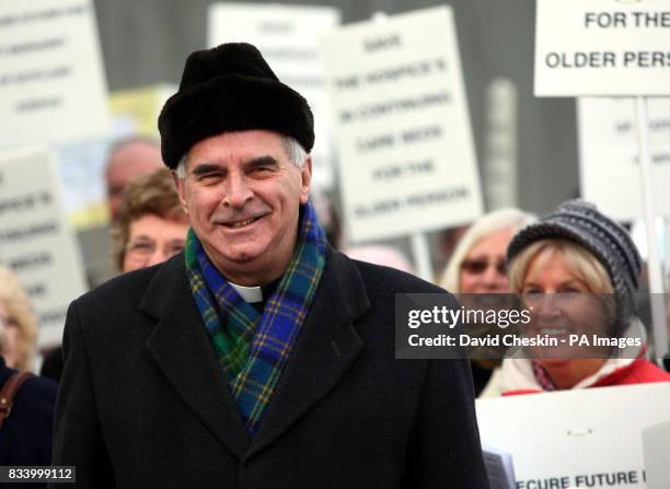 Cardinal Keith O'Brien leads a carol concert before petitioning MSPs on the future of St Margaret of Scotland hospice outside Scottish Parliament,...