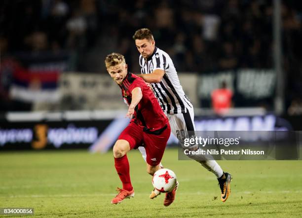 Dennis Widgren of Oestersunds FK and Róbert Mak of PAOK Saloniki FC competes for the ball during the UEFA Europa League Qualifying Play-Offs round...