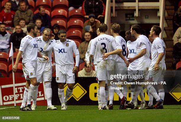 West Ham United's Dean Ashton celebrates with his team mates after scoring the 2nd goal of the game.