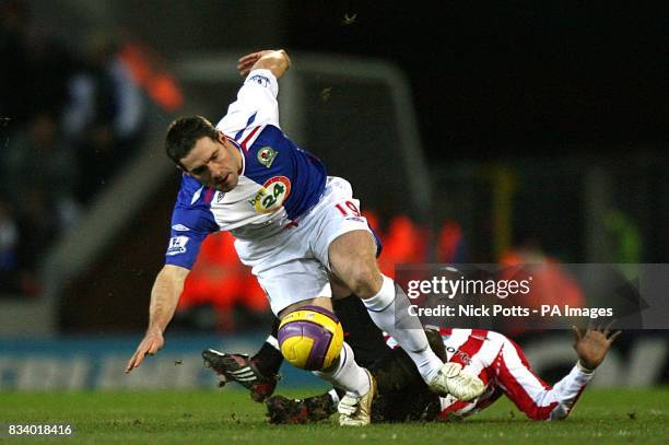 Sunderland's Dwight Yorke fouls Blackburn Rovers' David Dunn leadinf to the midfielder being sent off.