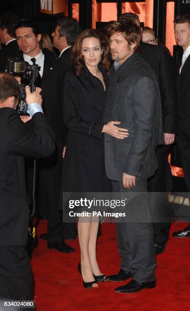 Angelina Jolie and husband Brad Pitt arrive for the Critics' Choice Awards at the Santa Monica Civic Auditorium in Santa Monica, California.