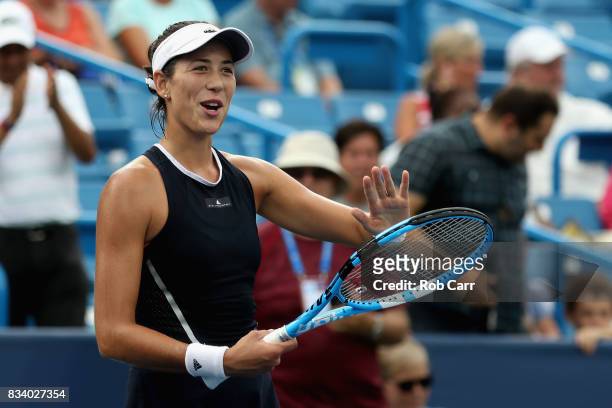 Garbine Muguruza of Spain celebrates after defeating Madison Keys during Day 6 of the Western and Southern Open at the Linder Family Tennis Center on...