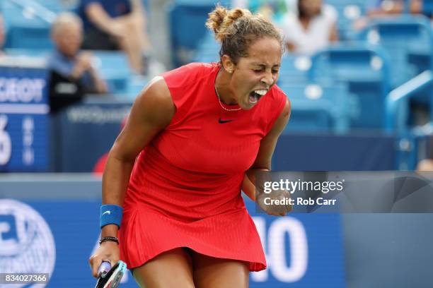 Madison Keys celebrates after winning a point against Garbine Muguruza of Spain during Day 6 of the Western and Southern Open at the Linder Family...