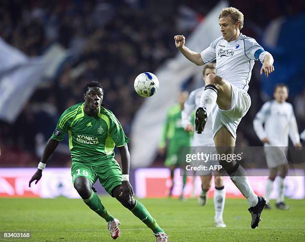 Saint Etienne's Bafetimbi Gomis vies with FC Copenhagen's Ulrik Laursen during the UEFA Cup group G match on October 23, 2008 in Parken Stadium in...