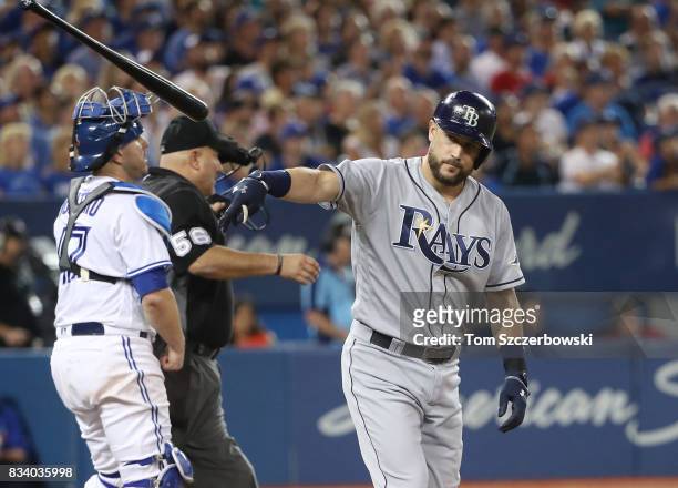 Trevor Plouffe of the Tampa Bay Rays reacts as he pops out with the bases loaded in the sixth inning during MLB game action against the Toronto Blue...